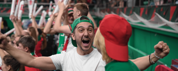 Sports fans cheering after a big win